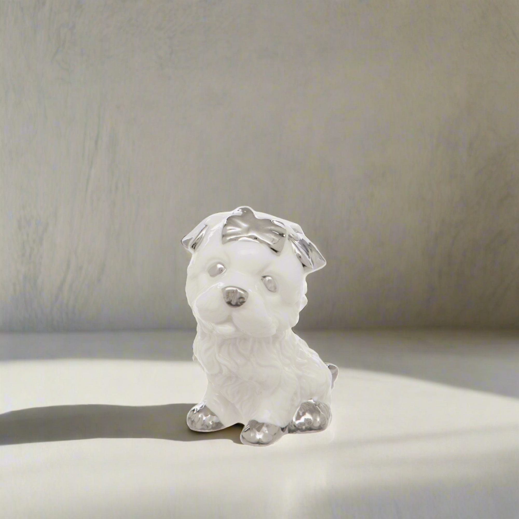 White Ceramic Dog Figurine With Silver Bow